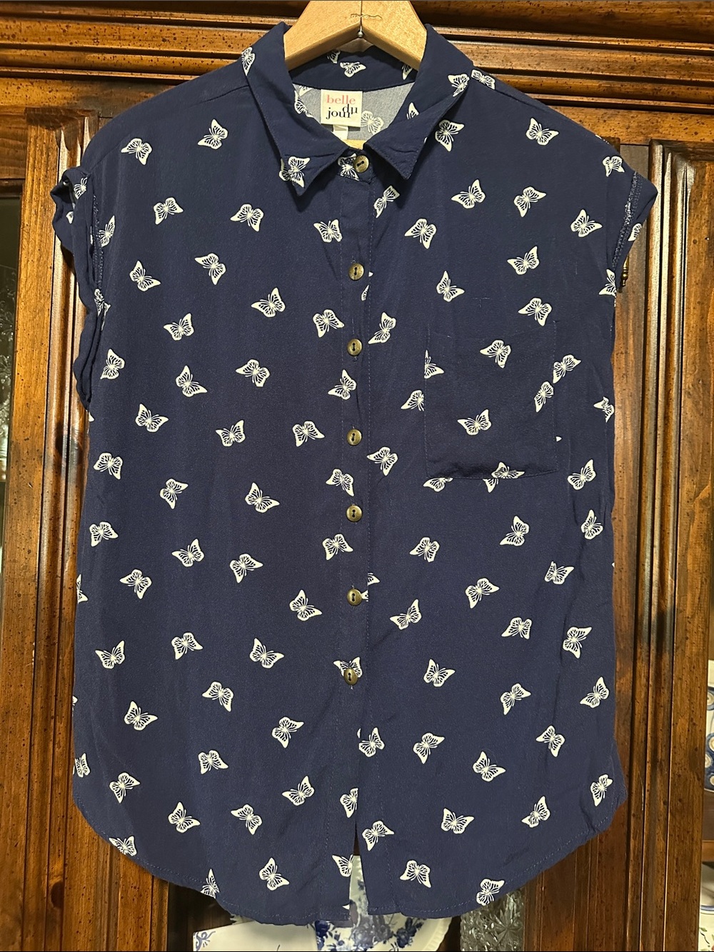 Belle Du Jour Navy Sleeveless Butterfly Button-Up Blouse